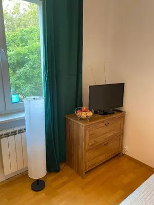 Telewizja i/lub zestaw kina domowego w obiekcie Na Wspólnej Apartament