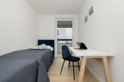 Łóżko lub łóżka w pokoju w obiekcie Goodnight Apartments Białołęka with 2 Bedrooms & Parking by Noclegi Renters