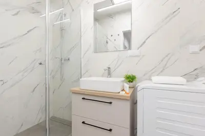 Łazienka w obiekcie Goodnight Apartments Białołęka with 2 Bedrooms & Parking by Noclegi Renters