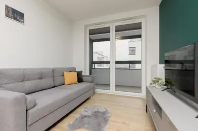 Telewizja i/lub zestaw kina domowego w obiekcie Goodnight Apartments Białołęka with 2 Bedrooms & Parking by Noclegi Renters