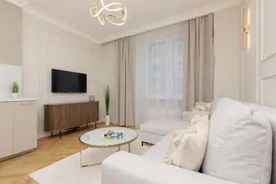 Telewizja i/lub zestaw kina domowego w obiekcie Bright & Elegant Apartment Warsaw by Noclegi Renters