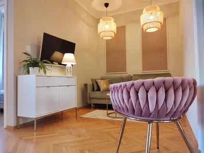 Telewizja i/lub zestaw kina domowego w obiekcie Day & Night by Cooee Apartments