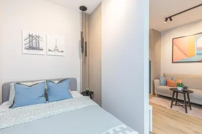 Łóżko lub łóżka w pokoju w obiekcie SuperApart Konstruktorska 5e - By Westfield Mokotów