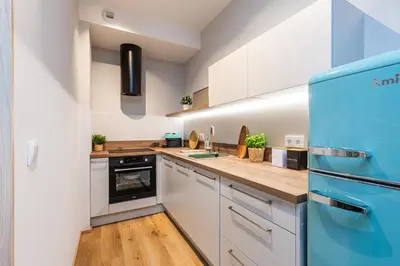 Kuchnia lub aneks kuchenny w obiekcie SuperApart Konstruktorska 5e - By Westfield Mokotów