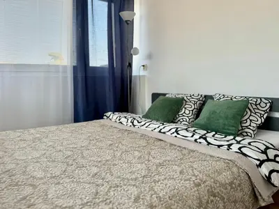Łóżko lub łóżka w pokoju w obiekcie K22 Zgoda 13 Lite centrum Warszawy