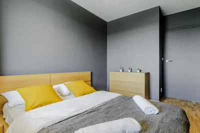 Łóżko lub łóżka w pokoju w obiekcie Apartament CH Promenada
