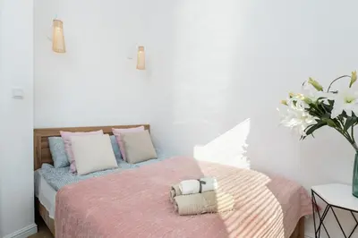 Łóżko lub łóżka w pokoju w obiekcie Wiktoryn 21 Citysphere Premium Suite 2