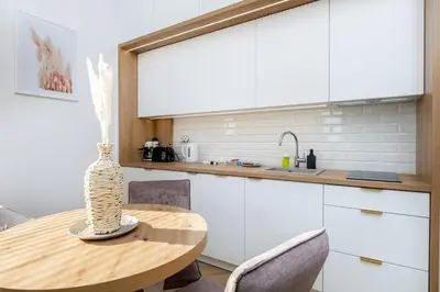 Kuchnia lub aneks kuchenny w obiekcie Wiktoryn 21 Citysphere Premium Suite 2