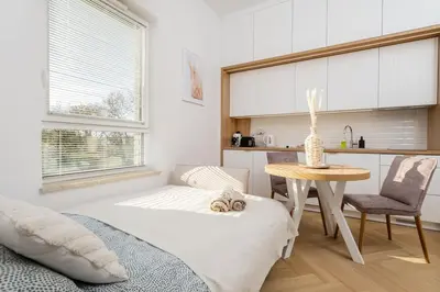 Łóżko lub łóżka w pokoju w obiekcie Wiktoryn 21 Citysphere Premium Suite 2