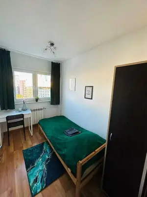 Łóżko lub łóżka w pokoju w obiekcie City View Rooms