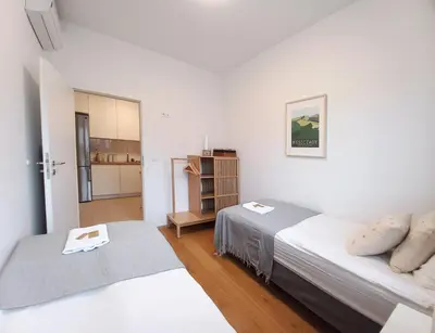 Łóżko lub łóżka w pokoju w obiekcie Warsaw Concierge Hoża Centrum