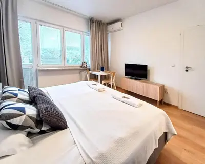 Łóżko lub łóżka w pokoju w obiekcie Warsaw Concierge Hoża Centrum