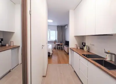 Kuchnia lub aneks kuchenny w obiekcie Warsaw Concierge Hoża Centrum