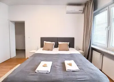 Łóżko lub łóżka w pokoju w obiekcie Warsaw Concierge Hoża Centrum