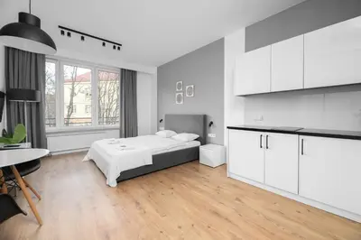 Łóżko lub łóżka w pokoju w obiekcie Warsaw Concierge Warszawa Zachodnia