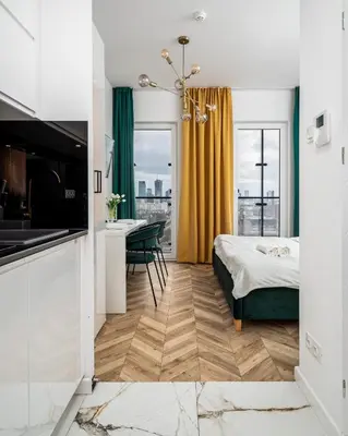 Łóżko lub łóżka w pokoju w obiekcie Warsaw Modern Stay Apartamenty Kasprzaka 29
