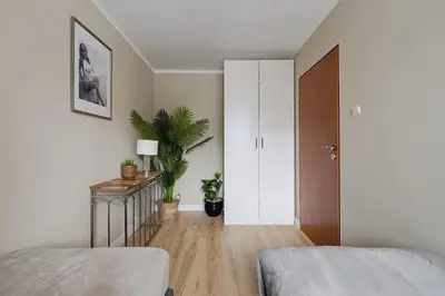 Łóżko lub łóżka w pokoju w obiekcie Privilage Location Apartament w Centrum
