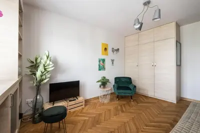 Telewizja i/lub zestaw kina domowego w obiekcie Boutique Apartment Emilii Plater 55 Two Rooms Apartment Balcony