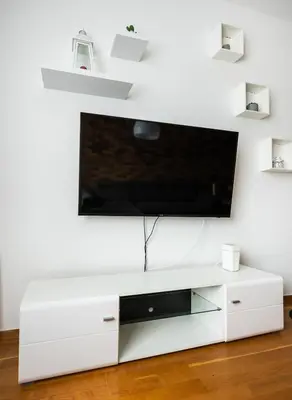 Telewizja i/lub zestaw kina domowego w obiekcie Chmielna City Centre Apartment by BookingHost