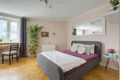 Łóżko lub łóżka w pokoju w obiekcie Apartment Your Home in Center of Warsaw