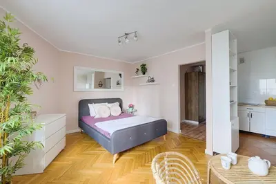 Łóżko lub łóżka w pokoju w obiekcie Apartment Your Home in Center of Warsaw