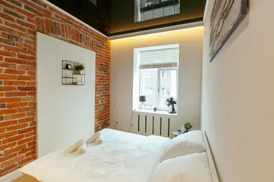 Łóżko lub łóżka w pokoju w obiekcie Wspólna 54a - free Parking - Apartament dla 6 osób - 450 metrów od Dworca Centralnego i Złotych Tarasów - Better Rental