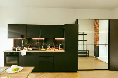 Kuchnia lub aneks kuchenny w obiekcie Wspólna 54a - free Parking - Apartament dla 6 osób - 450 metrów od Dworca Centralnego i Złotych Tarasów - Better Rental