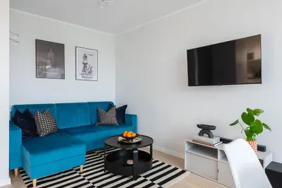 Telewizja i/lub zestaw kina domowego w obiekcie Bella Luna Luxury Suites - Oasis Gem in Warsaw