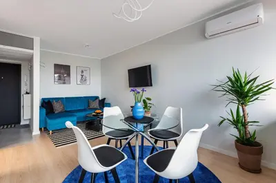 Telewizja i/lub zestaw kina domowego w obiekcie Bella Luna Luxury Suites - Oasis Gem in Warsaw