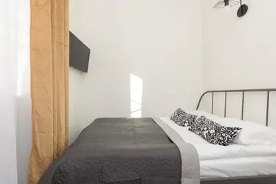 Łóżko lub łóżka w pokoju w obiekcie Budget-Friendly Studio Metro Wilanowska Warsaw Mokotów by Noclegi Renters