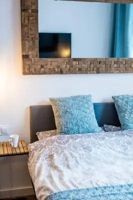 Łóżko lub łóżka w pokoju w obiekcie Stylish&Modern Studio in the heart of Warsaw!New!