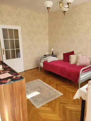 Łóżko lub łóżka w pokoju w obiekcie Apartament Złota 67