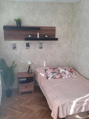 Łóżko lub łóżka w pokoju w obiekcie Apartament Złota 67