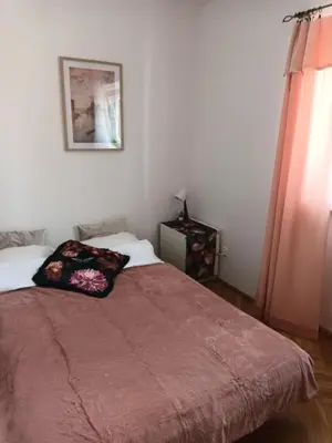 Łóżko lub łóżka w pokoju w obiekcie Apartament Złota 67