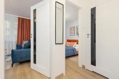 Łóżko lub łóżka w pokoju w obiekcie Central Warsaw Apartment Żurawia by Noclegi Renters