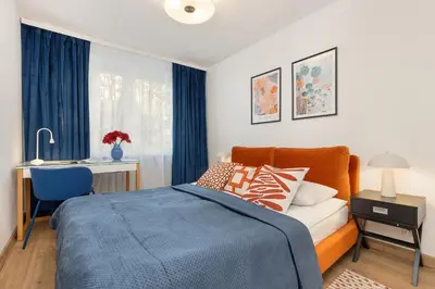 Łóżko lub łóżka w pokoju w obiekcie Central Warsaw Apartment Żurawia by Noclegi Renters