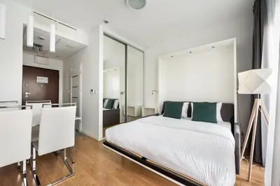 Łóżko lub łóżka w pokoju w obiekcie Varsovia Comfort 629 by BookingHost