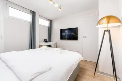 Łóżko lub łóżka w pokoju w obiekcie Apartament Grzybowska Premium by Your Freedom
