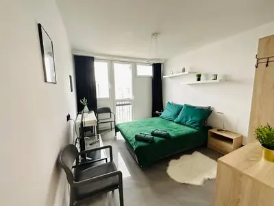 Część wypoczynkowa w obiekcie Warsaw City Center Rooms