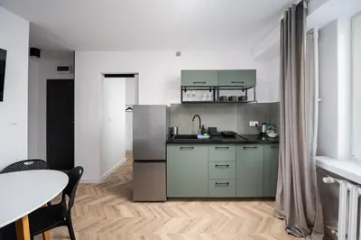 Kuchnia lub aneks kuchenny w obiekcie Służew 405A Apartment by BookingHost