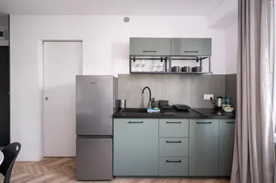 Kuchnia lub aneks kuchenny w obiekcie Służew 405A Apartment by BookingHost