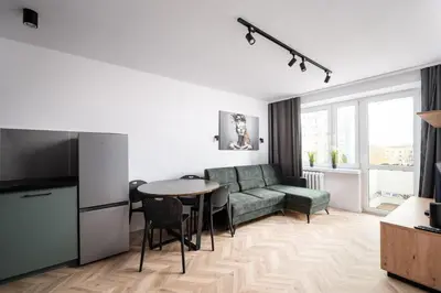 Telewizja i/lub zestaw kina domowego w obiekcie Służew 405B Apartment by BookingHost