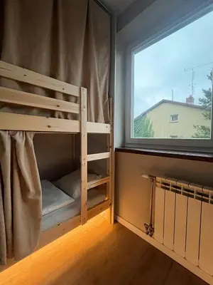 Łóżko lub łóżka w pokoju w obiekcie WOW HOME