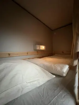 Łóżko lub łóżka w pokoju w obiekcie WOW HOME