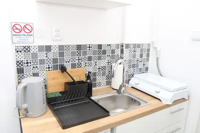 Kuchnia lub aneks kuchenny w obiekcie Saska Kępa Luxe Apartment