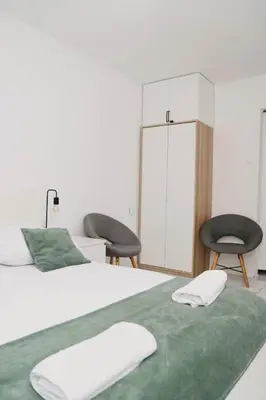 Łóżko lub łóżka w pokoju w obiekcie Saska Kępa Luxe Apartment