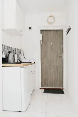 Kuchnia lub aneks kuchenny w obiekcie Saska Kępa Luxe Apartment