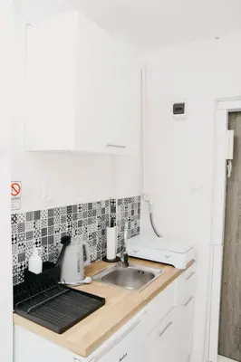 Kuchnia lub aneks kuchenny w obiekcie Saska Kępa Luxe Apartment