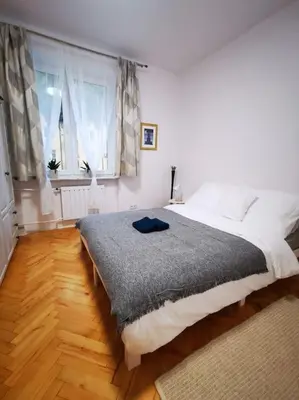 Łóżko lub łóżka w pokoju w obiekcie Cosy condo