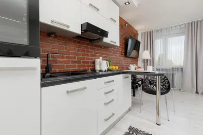Kuchnia lub aneks kuchenny w obiekcie Bright & Cozy Studio near Metro Marymont by Noclegi Renters